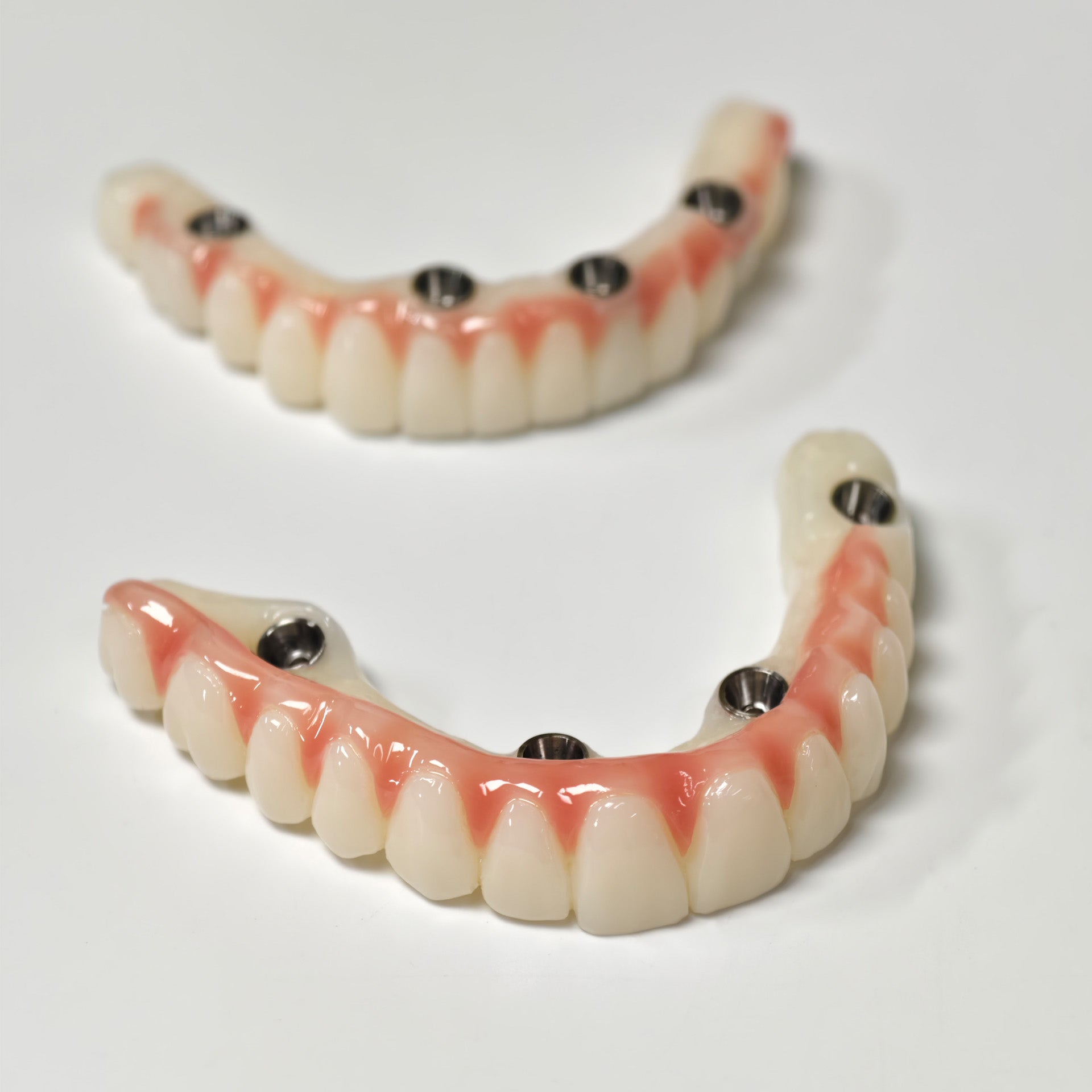 Full-Arch PMMA Bridge With Ti-Base Screw Retained
