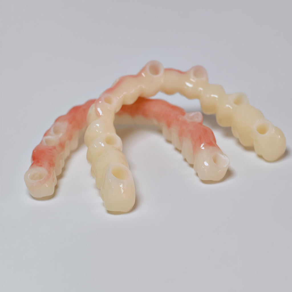 Full-Arch Zirconia Bridge And PMMA Bridge With Cement Retained