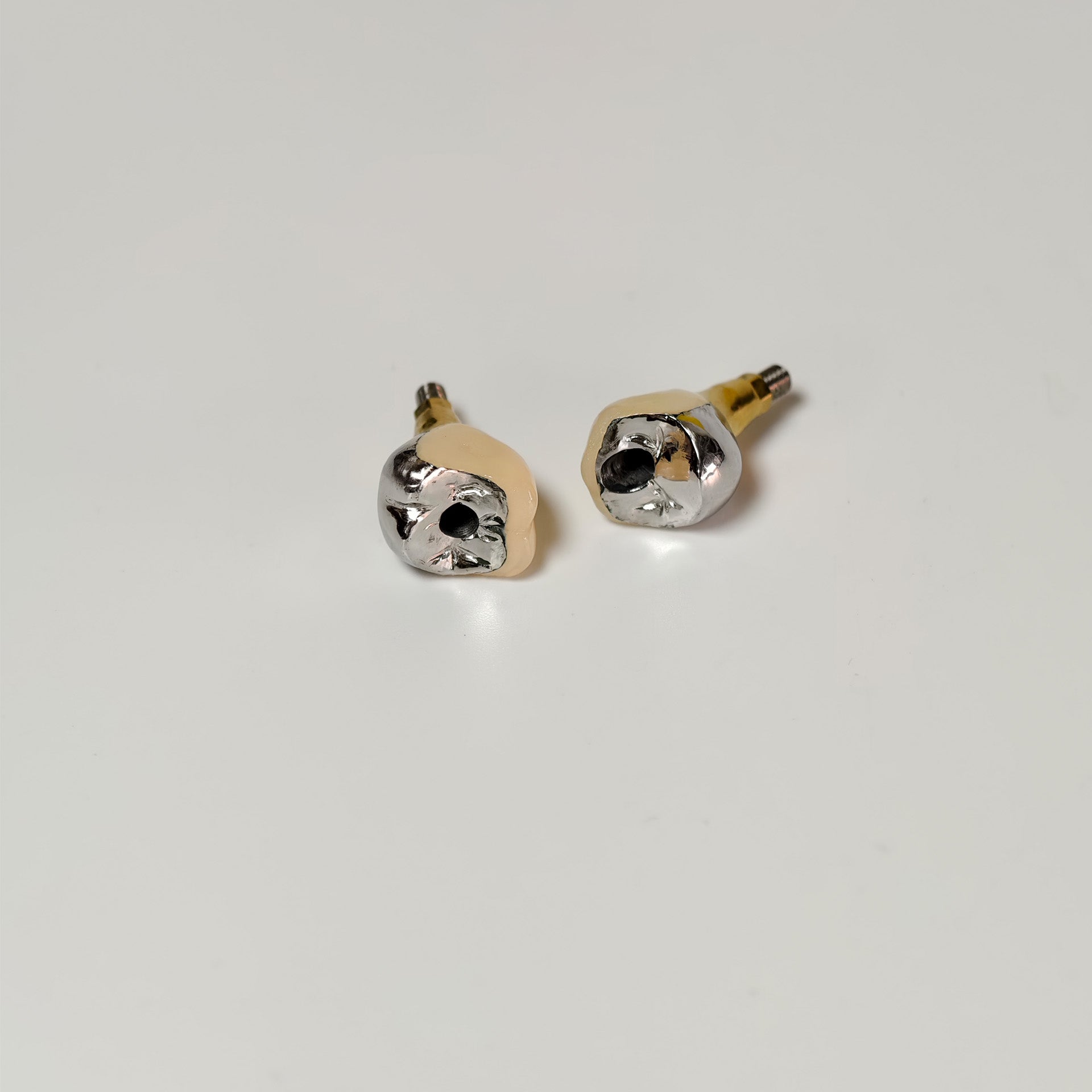 Implant-Supported PFM Single Crowns With Metal
