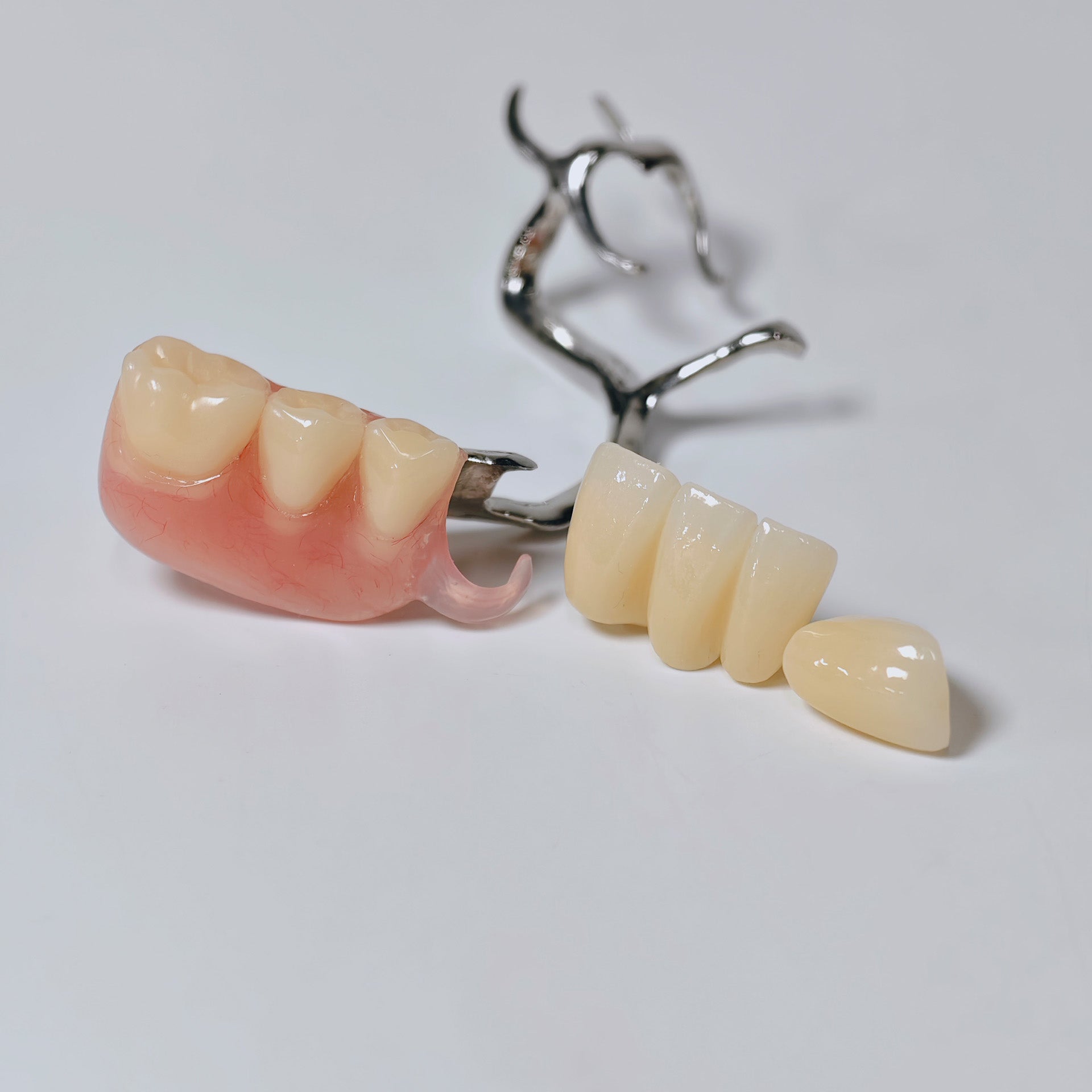 Full-Zirconia Crown And Bridge With Cement Retained And Co-Cr Frame Partial Denture