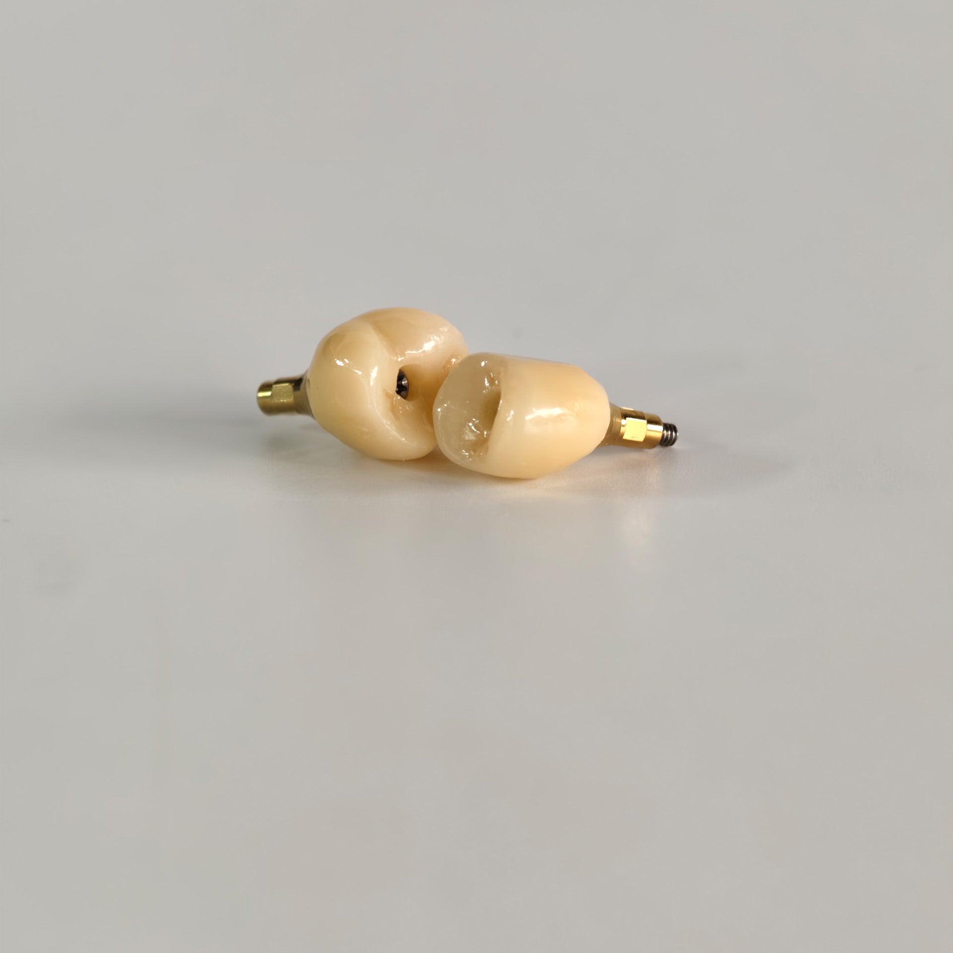 Zirconia Crowns With Screw Retained And Gold-Plated Custom Abutment