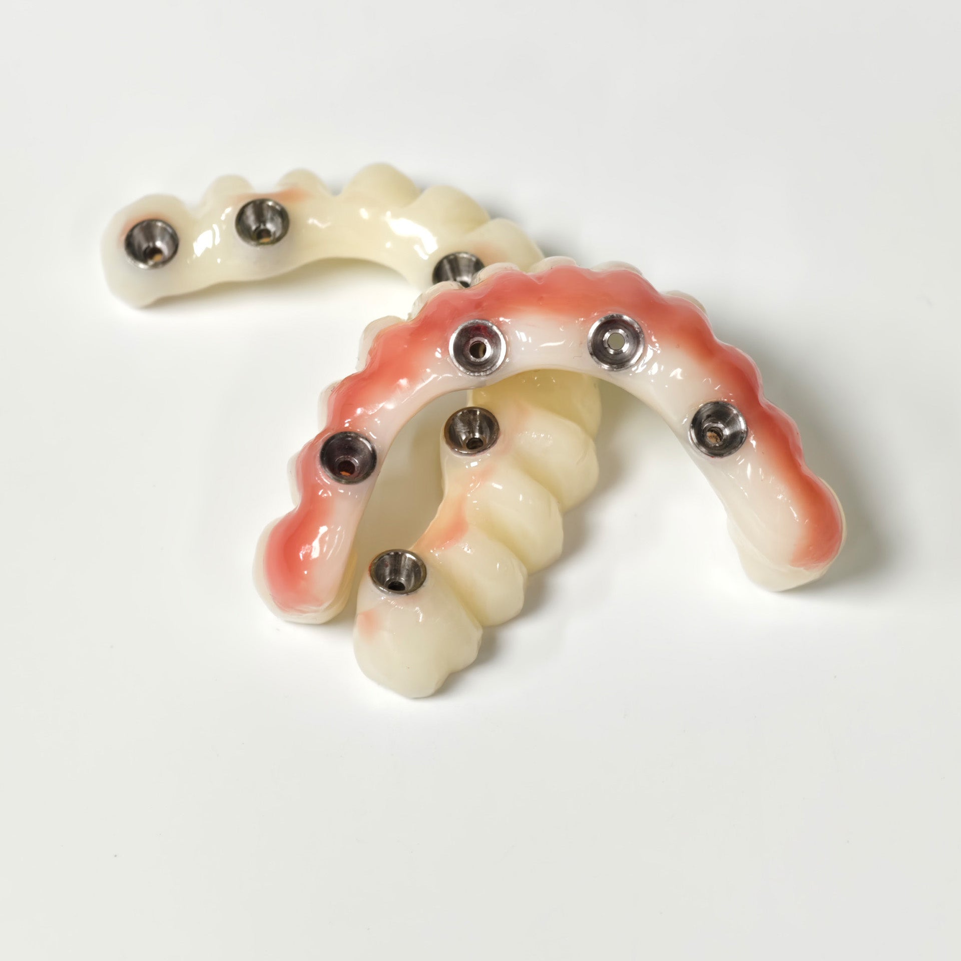 Full-Arch PMMA Bridge With Ti-Base Screw Retained